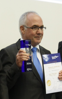 Hans-Hermann Ruschmeyer, früherer Geschäftsführer der Dreyer+Timm GmbH, nahm 2014 den Telematik Award für die kombinierte Telematik-Lösung "scomsens und scombox" entgegen. Bild: Telematik-Markt.de